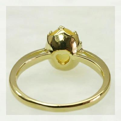 イエローカルサイトオーバルカボション リング PT900 K18 K10対応の画像