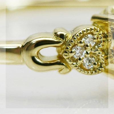ハートで映えるセンターストーン スペサタイトガーネット ダイヤモンドリング 誕生石 1月 PT900 K18 K10対応の画像