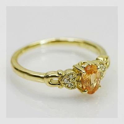 ハートで映えるセンターストーン スペサタイトガーネット ダイヤモンドリング 誕生石 1月 PT900 K18 K10対応の画像
