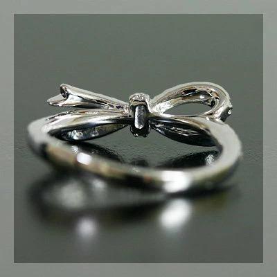 ダイヤモンド リボン リング フィセル” 誕生石 4月 PT900 K18 K10対応の画像