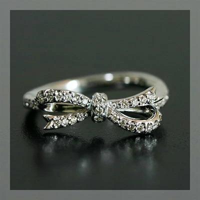 ダイヤモンド リボン リング フィセル” 誕生石 4月 PT900 K18 K10対応の画像