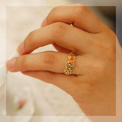 パヴォーネ”スペサタイトガーネットトリリアントリング PT900 K18 K10対応 誕生石 1月の画像