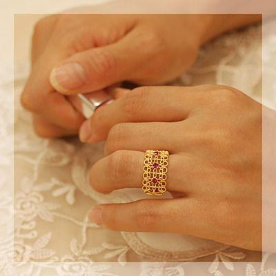 ナストゥラーレ サンエンタープライズ社ルビーリング 誕生石 7月　PT900 K18 K10対応の画像
