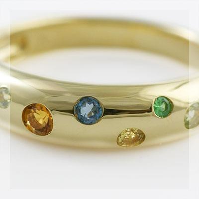 マルチカラー７石の宝石ドッツリング オリーブ PT900 K18 K10対応の画像