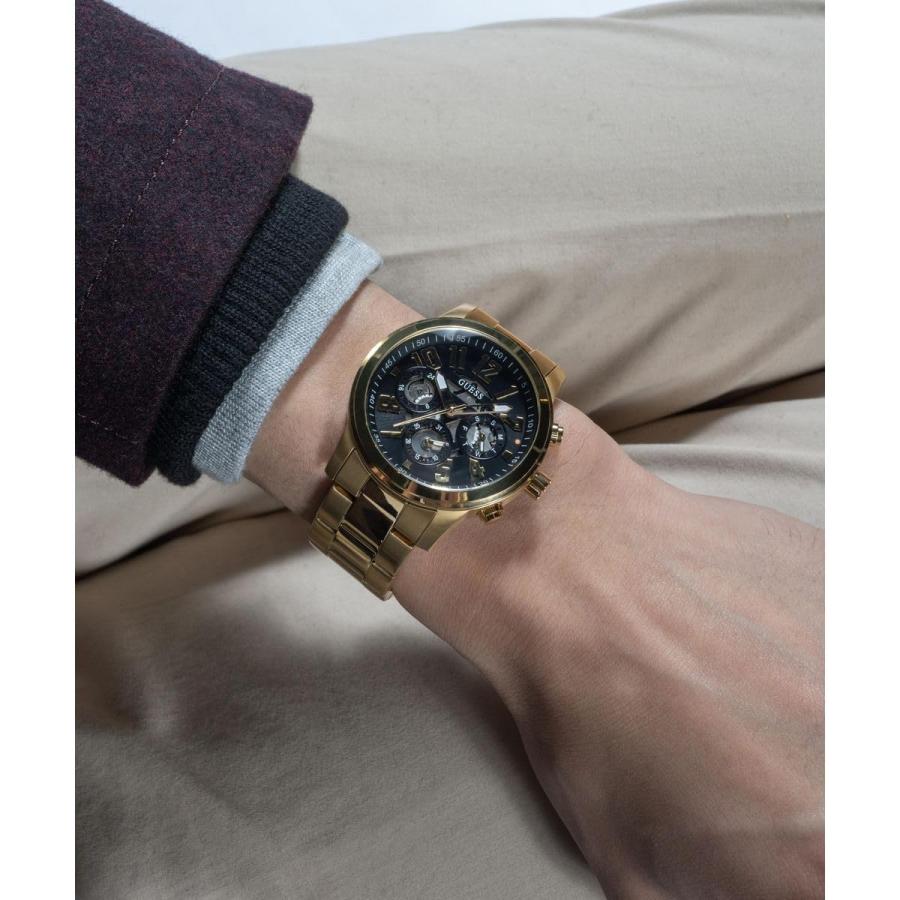 GUESS メンズ 44mm クォーツ腕時計 ゴールドトーン ステンレスブレスレット ブラックダイヤル マルチファンクションの画像