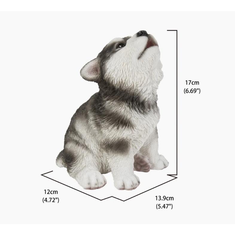 かわいい遠吠えのアラスカンマラミュートの子犬の本物そっくりの像