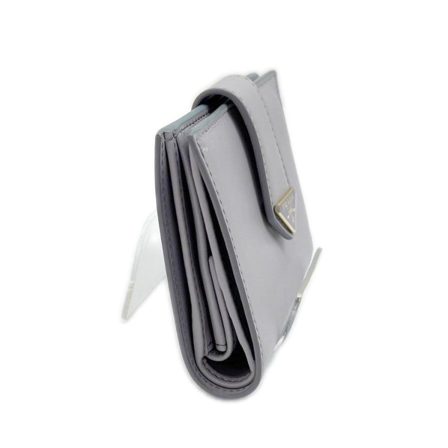 PRADA プラダ 2つ折り財布 パープル 少しヨゴレ有 箱付 薄紫 PRADA（プラダ） 2つ折り財布 パープル 少しヨゴレ有 箱付 薄紫 やや傷