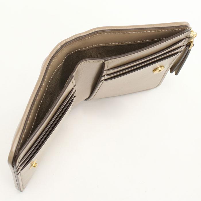 TORY BURCH（トリーバーチ） 二つ折り財布 小銭入付き キラ