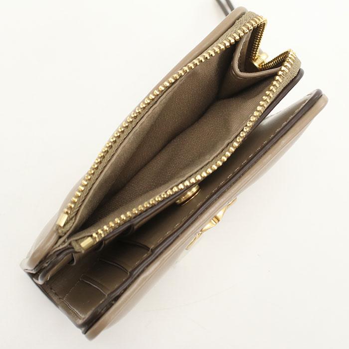 TORY BURCH（トリーバーチ） 二つ折り財布 小銭入付き キラ