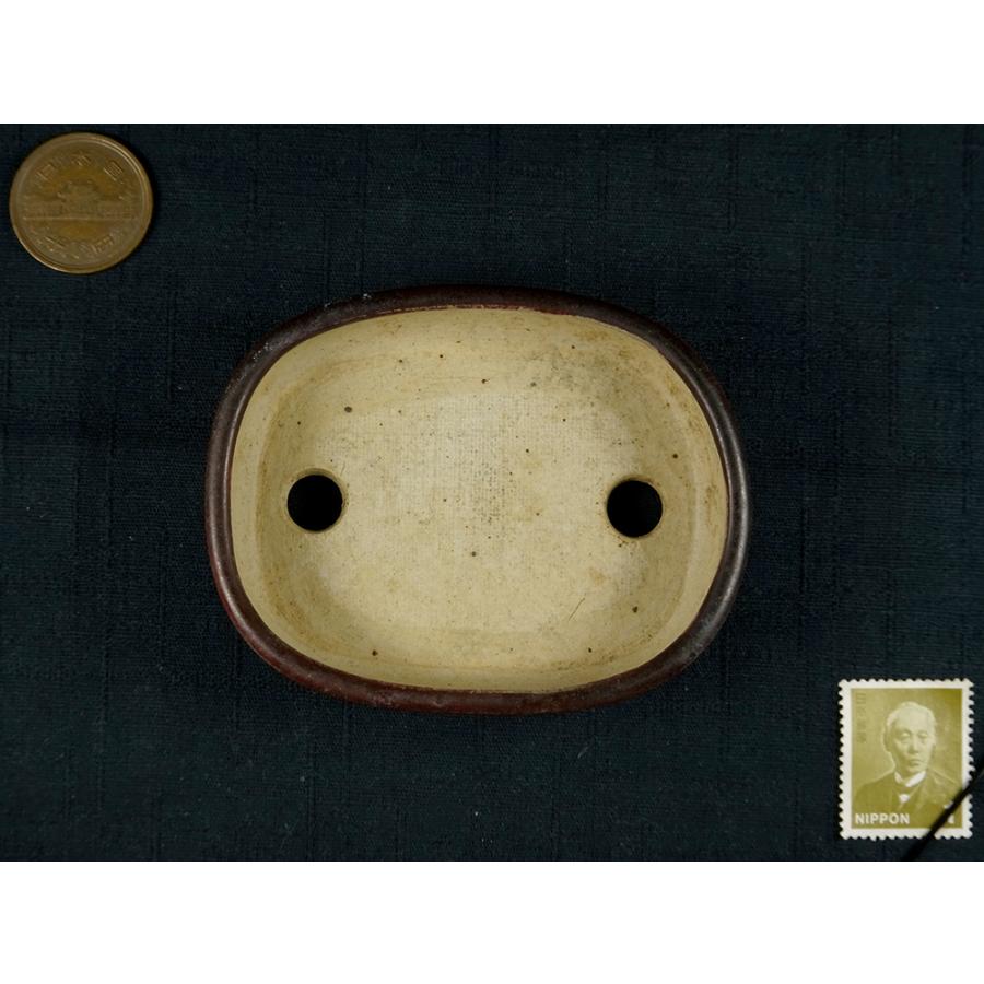 せいこ 辰砂釉窯変切立隅丸切足長方  横幅8.2cmの画像