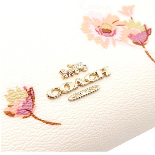 COACH 花とテントウムシのプリントポーチ COACH】コーチ レザー