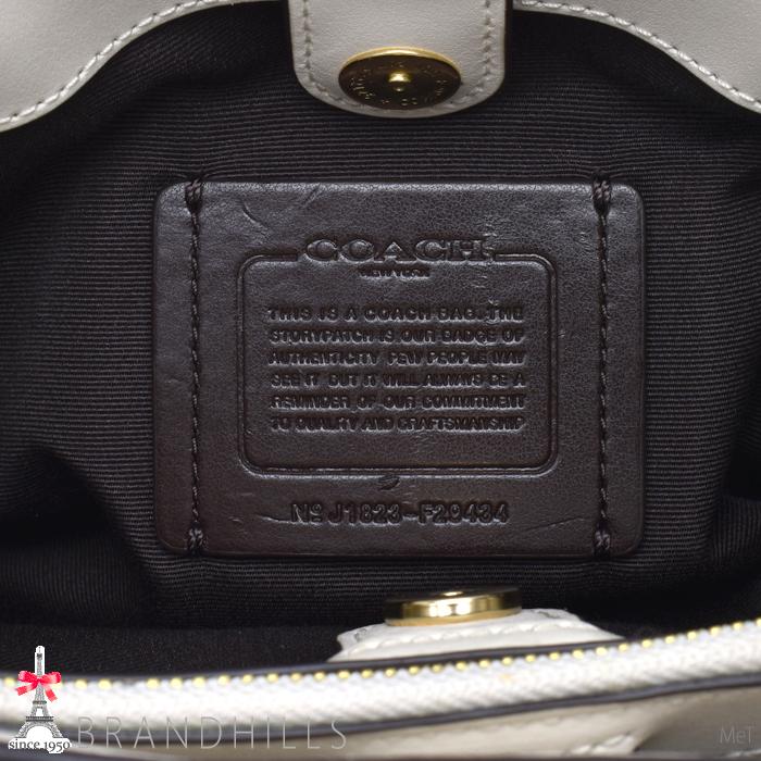 COACH（コーチ） ハンドバッグ レディース シグネチャー PVC ベージュ