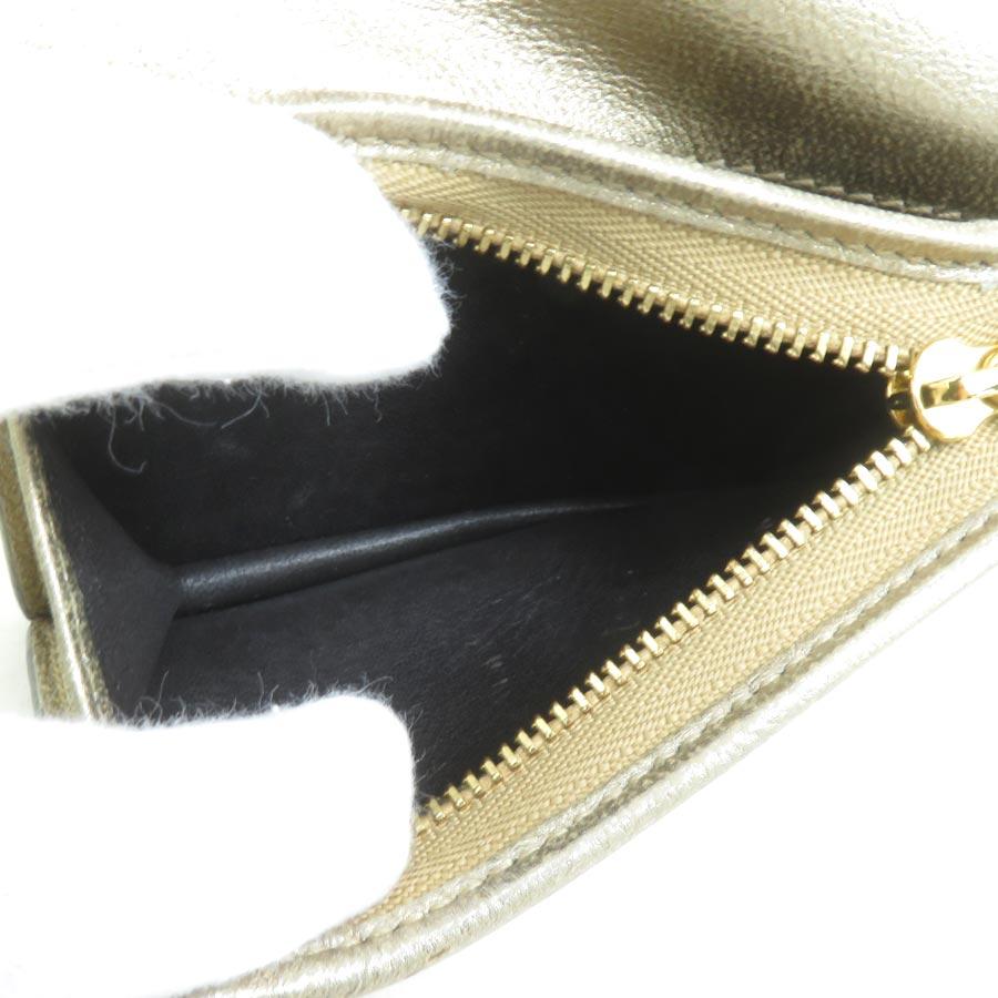 GUCCI（グッチ） 二つ折り財布 GGマーモント 型押しレザー ゴールド