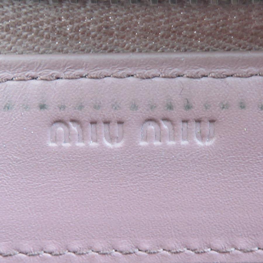miu miu（ミュウミュウ） ラウンドファスナー長財布 パテントレザー