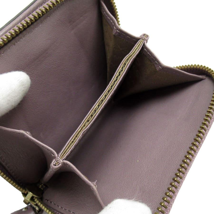 アニヤハインドマーチ Anya Hindmarch 二つ折り財布 リボン レザー