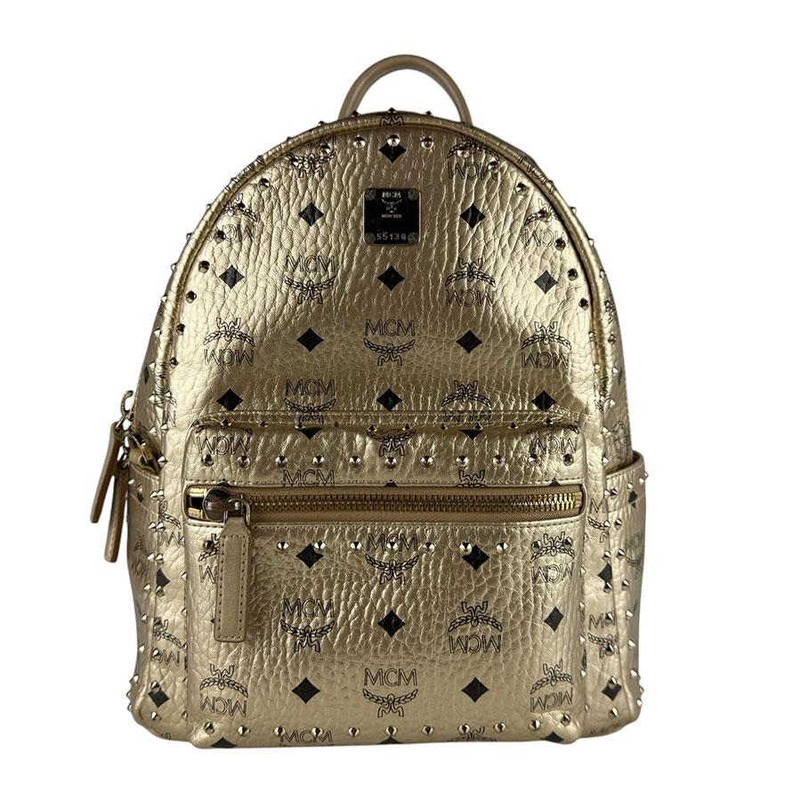 MCM（エムシーエム） エム シー エム リュック レザー/メタル ゴールド