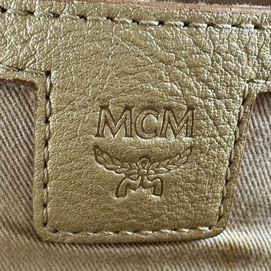 MCM（エムシーエム） エム シー エム リュック レザー/メタル ゴールド
