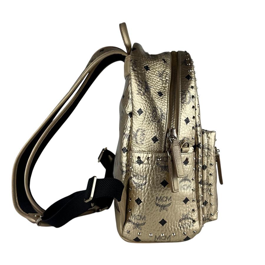 MCM（エムシーエム） エム シー エム リュック レザー/メタル ゴールド