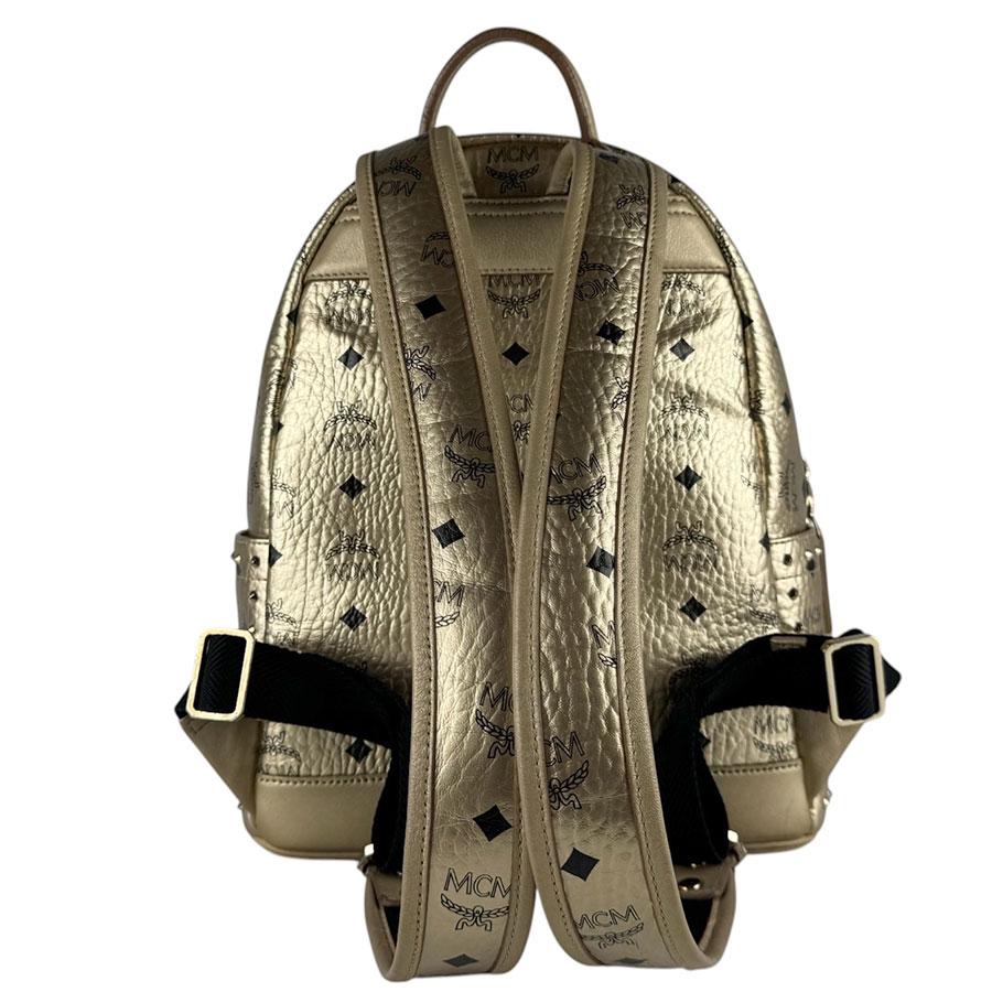 MCM（エムシーエム） エム シー エム リュック レザー/メタル ゴールド