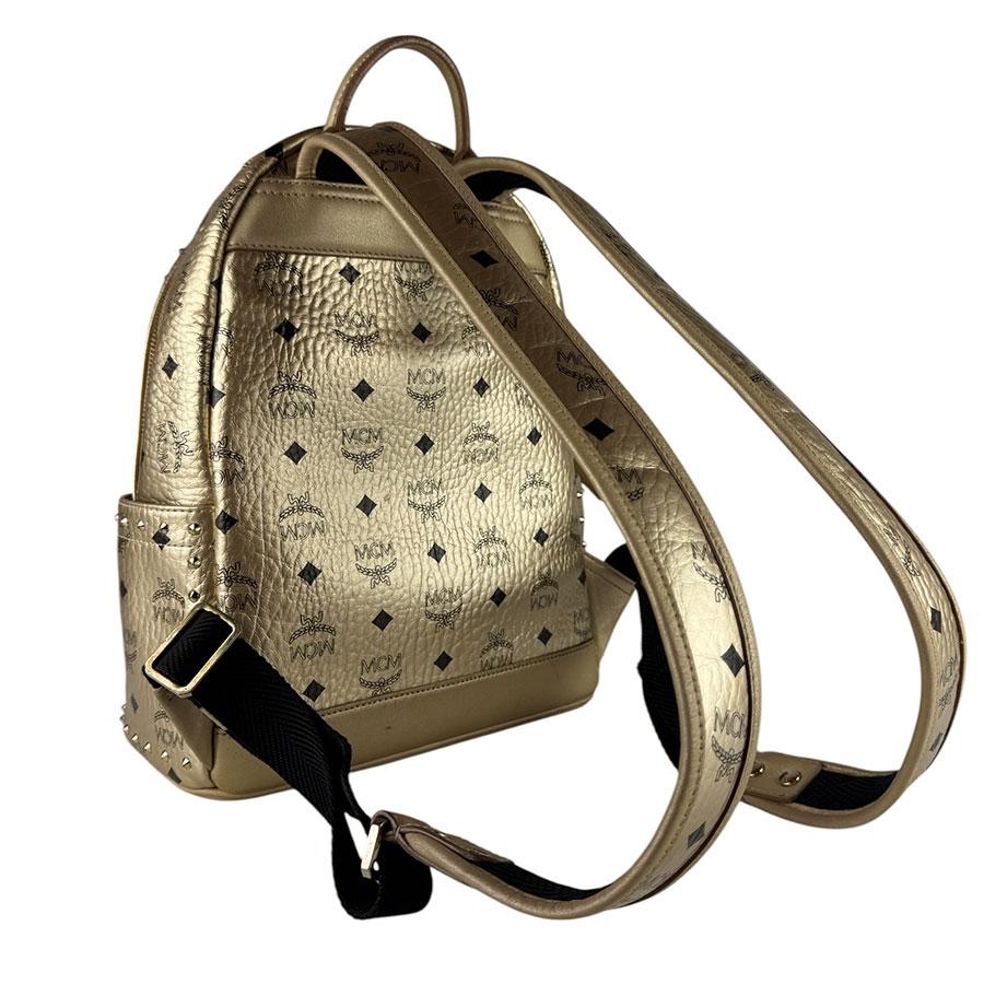 MCM（エムシーエム） エム シー エム リュック レザー/メタル ゴールド
