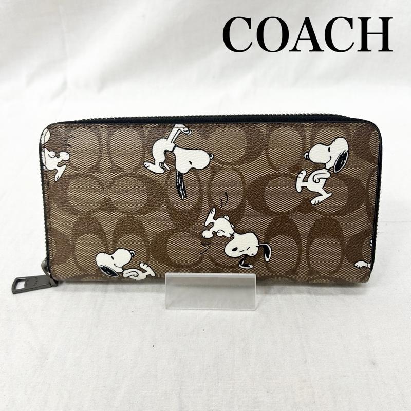 コーチ PEANUTS スヌーピー シグネチャー ラウンドジップ ブラウン