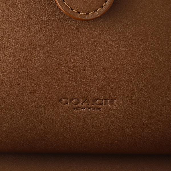 ゆう【新品未使用・即日発送】コーチ シグネチャー ワイルドフラワー COACH（コーチ） 並行輸入 2つ折り財布 シグネチャー ワイルドフラワー