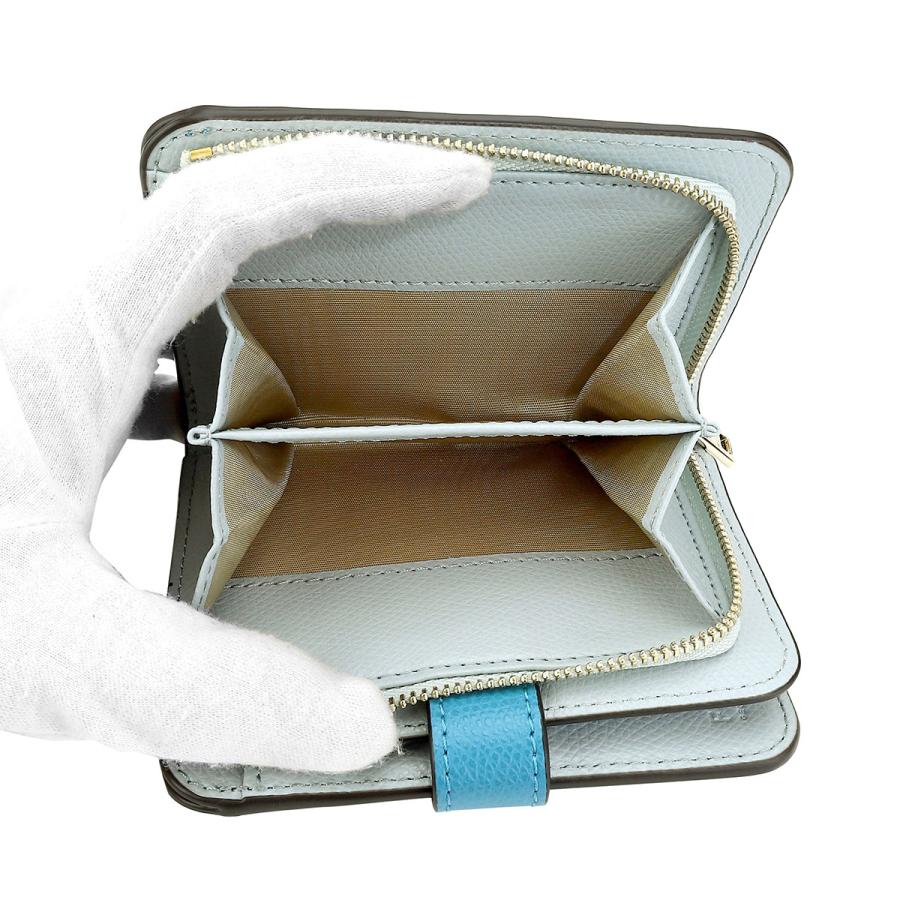 【新品未使用】FURLA 二つ折り財布 水色　定価34000円 フルラ FURLA 財布 二つ折り財布 折りたたみ財布 小銭入れ付き WP00314