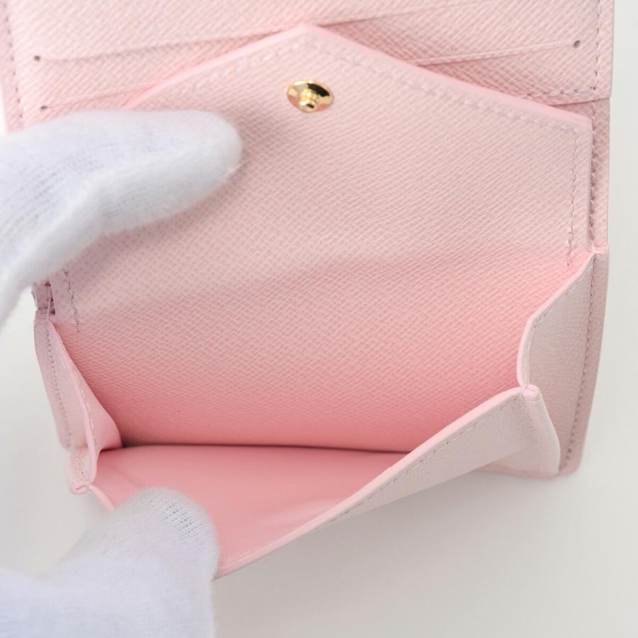 並行輸入 ルイヴィトン 2つ折り財布 LV スタンプ ポケットウォレット・LVチャーム M29058 | LOUIS VUITTON | 06