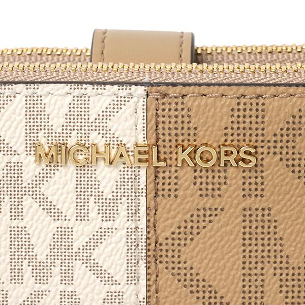 マイケルコース 二つ折り財布 MKシグネチャー ピンク ストライプ 総柄