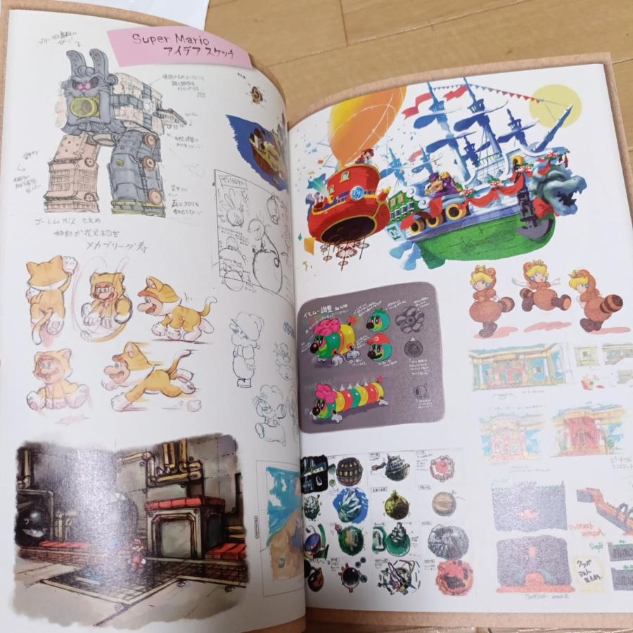 新品★任天堂ミュージアム公式ガイドブック Vol.01 日本語版★限定ポストカード2枚付/スーパーマリオブラザーズ40周年 /記念 /任天堂公式資料/限定品の画像
