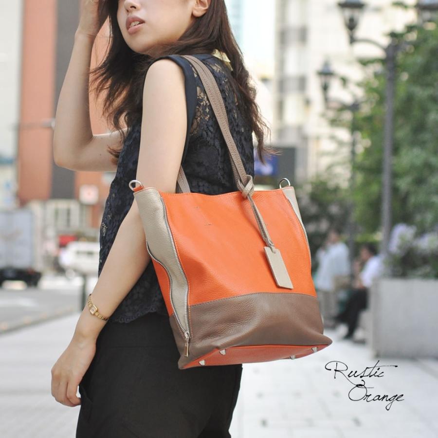 バッグ】リバーシブル トートバッグ 黒×オレンジ 馬チャーム付き