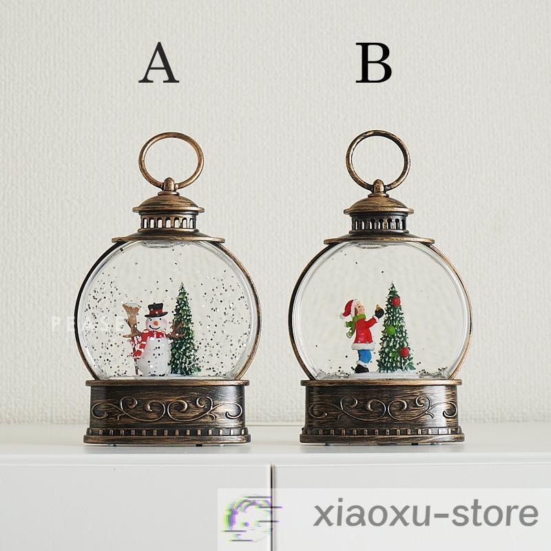 2個あります。クリスマスランタン 雪の舞い上がるエフェクト付き