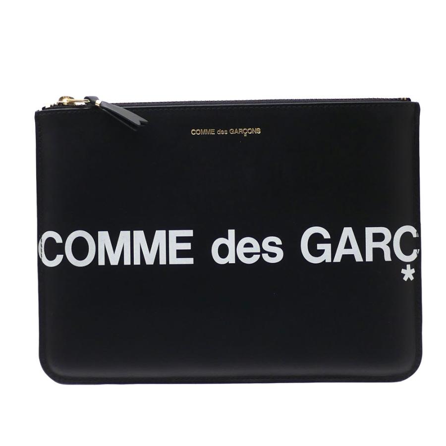 COMME des GARÇONS ネイビー クラッチバッグ COMME des GARÇONS ネイビー クラッチバッグ COMME des GARÇONS