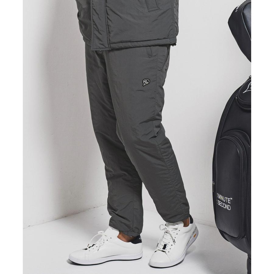1minute 1second（ワンミニットワンセカンド） ナイロンパンツ padded