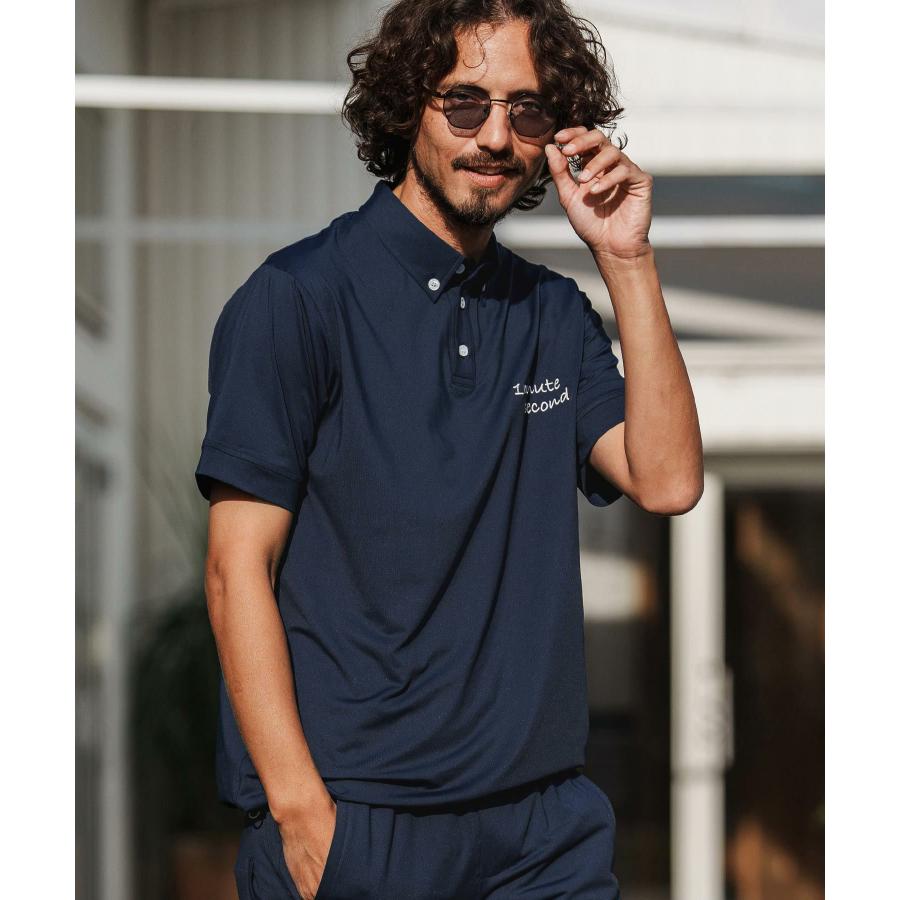 1minute 1second（ワンミニットワンセカンド） ポロシャツ cursive