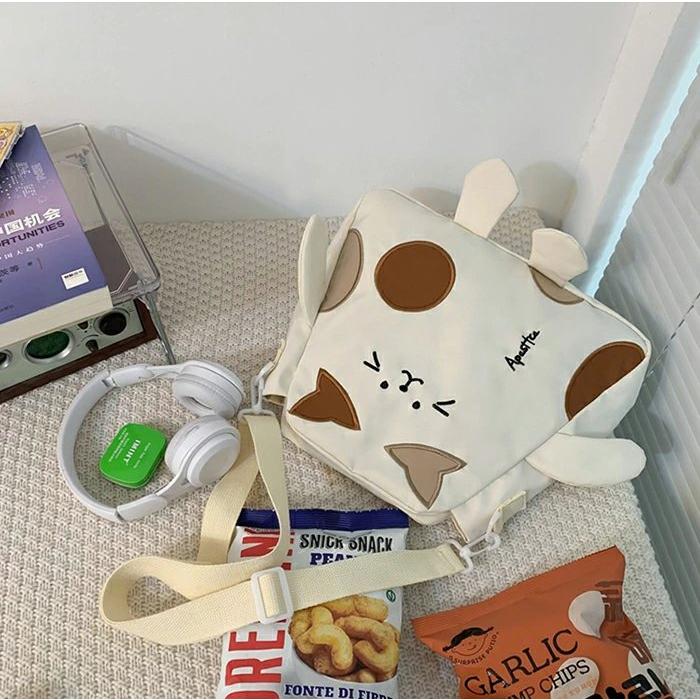 猫顔バッグ 猫柄 ねこ ショルダーバッグ バッグ 猫 ペット ハンドバッグ 斜めがけ 斜めがけバッグ 肩がけ 猫型 猫グッズ レディース 女の子 かわいい |  | 06
