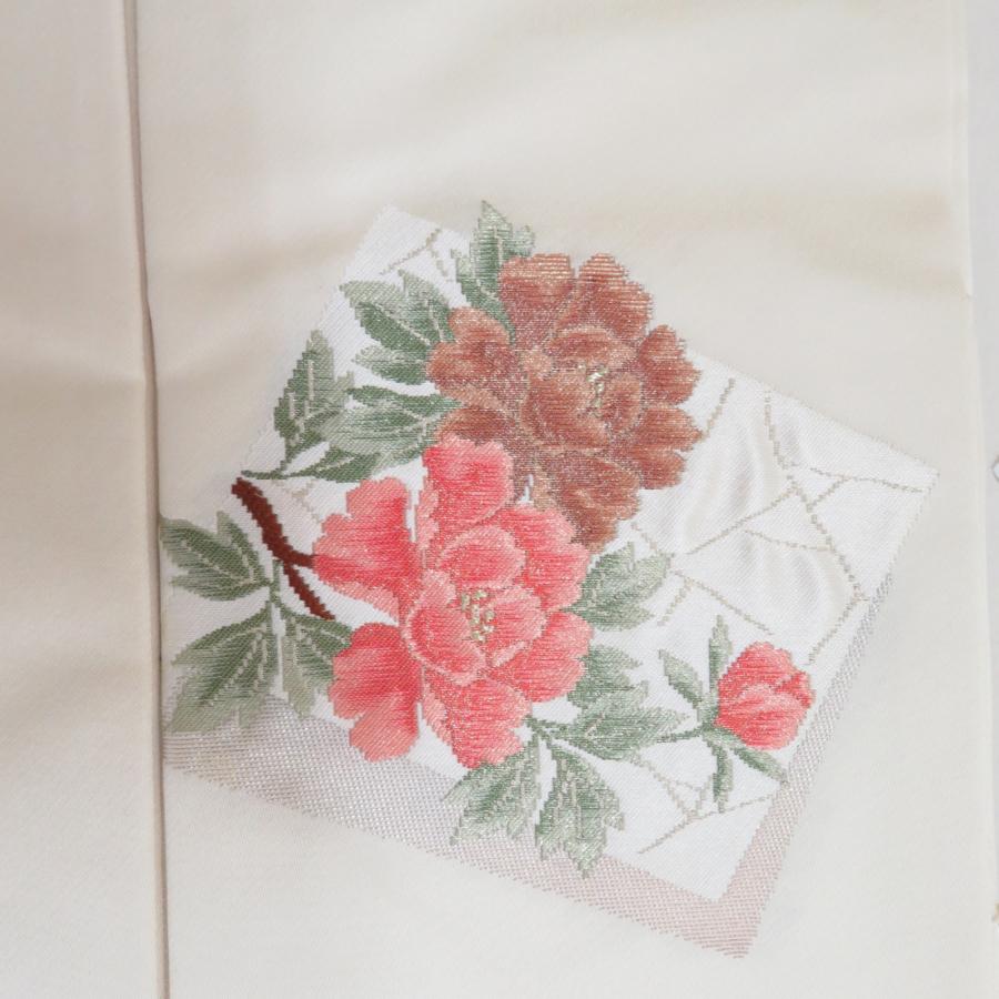 名古屋帯 西陣織り 仕付け糸付き 正絹 クリーム色ｘシルバーｘ多色 色紙に花々文様 お太鼓柄 未使用品 【キモノオフ野々市若松店】 名古屋帯 西陣織り 仕付け糸付き 正絹 クリーム色xシルバーx多色