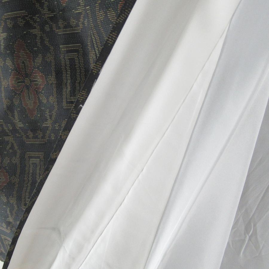 紬 着物 大島紬 幾何学模様に花 黒色ｘオレンジ色ｘ緑色 袷 広衿 正絹 仕立て上がり着物 身丈158cm |  | 08