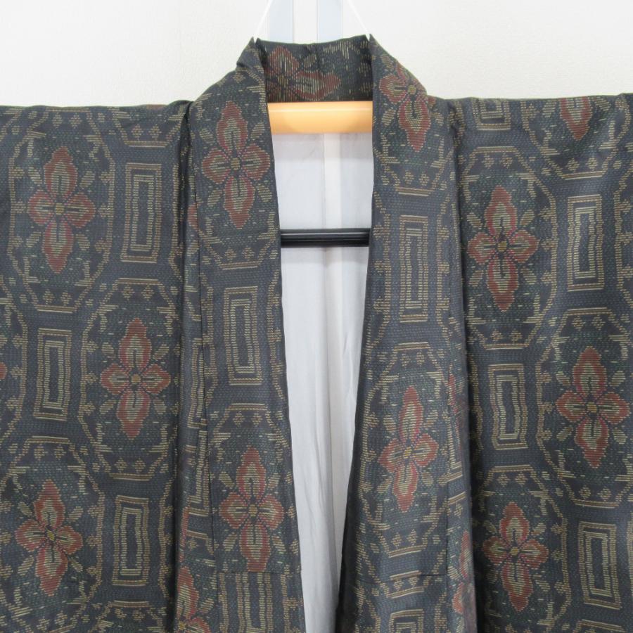 紬 着物 大島紬 幾何学模様に花 黒色ｘオレンジ色ｘ緑色 袷 広衿 正絹 仕立て上がり着物 身丈158cm |  | 09