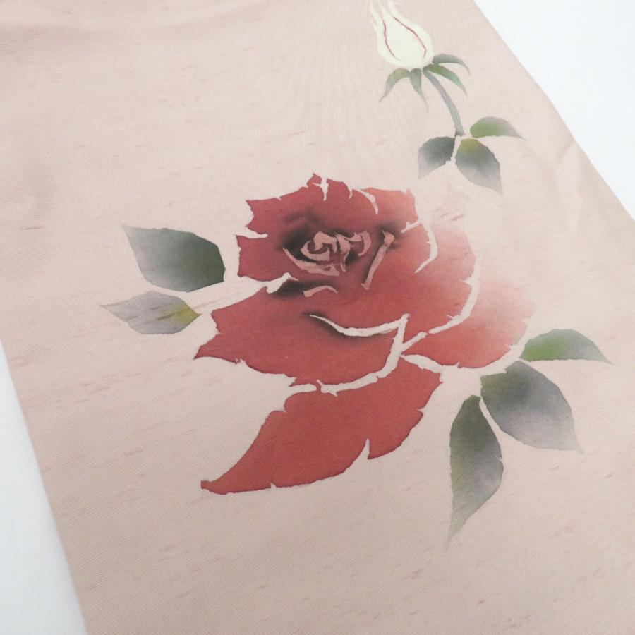 名古屋帯 正絹 紬地 薄ピンク地 薔薇柄 お太鼓柄 九寸帯 作家物 落款付