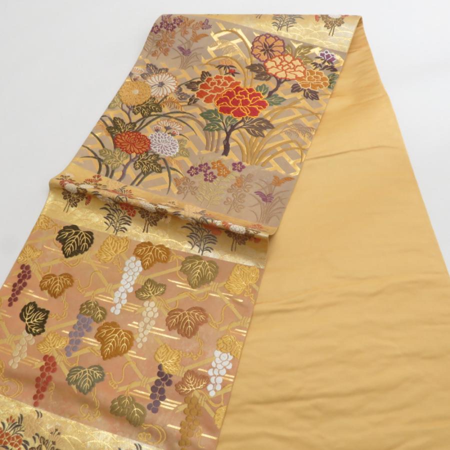 袋帯 西陣織 王朝華 引き箔 正絹 金糸 季節の花々文様 金色ｘ多色 ゴールド系 六通柄 フォーマル 未仕立て 礼装 長さ450cm【中古】 【キモノオフ野々市若松店】 袋帯 西陣織 王朝華 引き箔 正絹 金糸 季節の花々文様 金色x多色