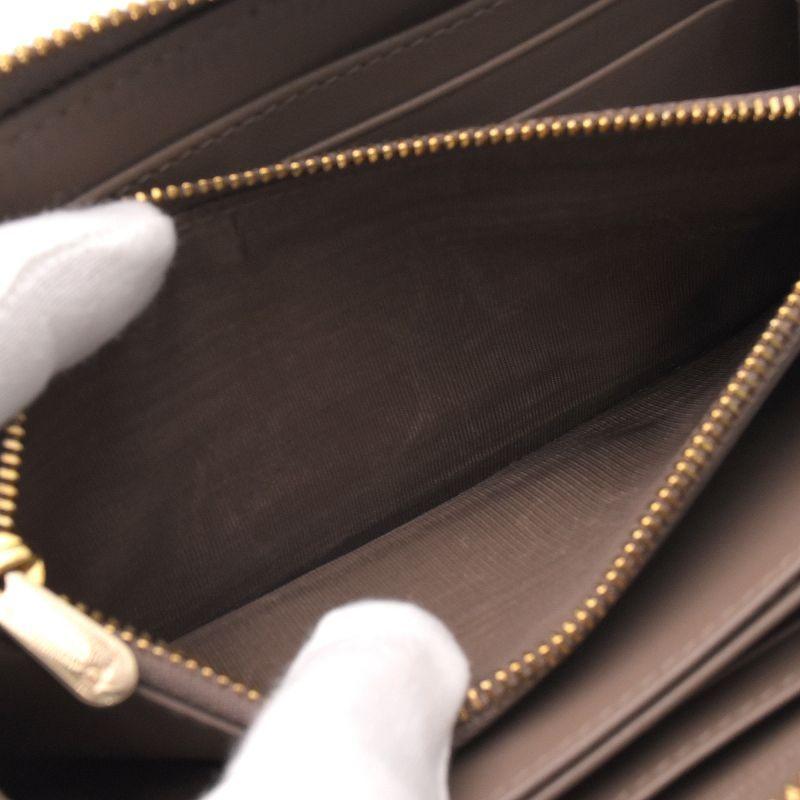 Lady Dior ディオール レディディオールヴォヤージュウォレット  