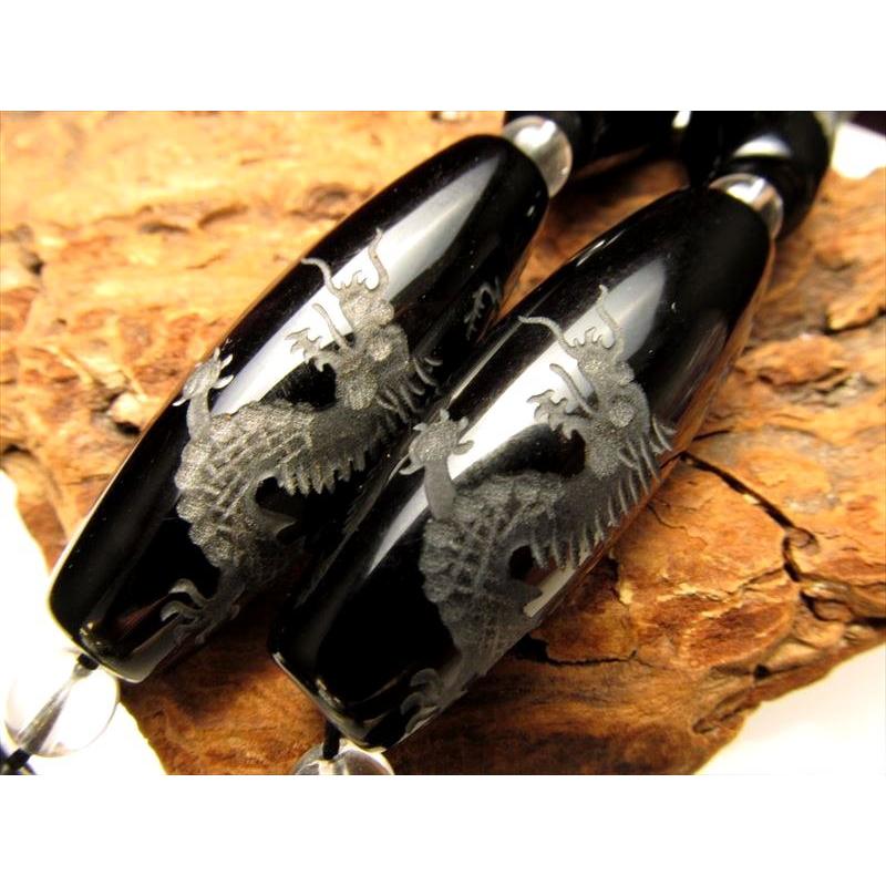 騎龍観音 オニキス天珠形 功徳利益を与える お買い得 騎龍観音彫刻オニキス天珠形 サイズ：約40mm前後 1個売り te- パワーストーン 天然石 | ブランド登録なし | 01