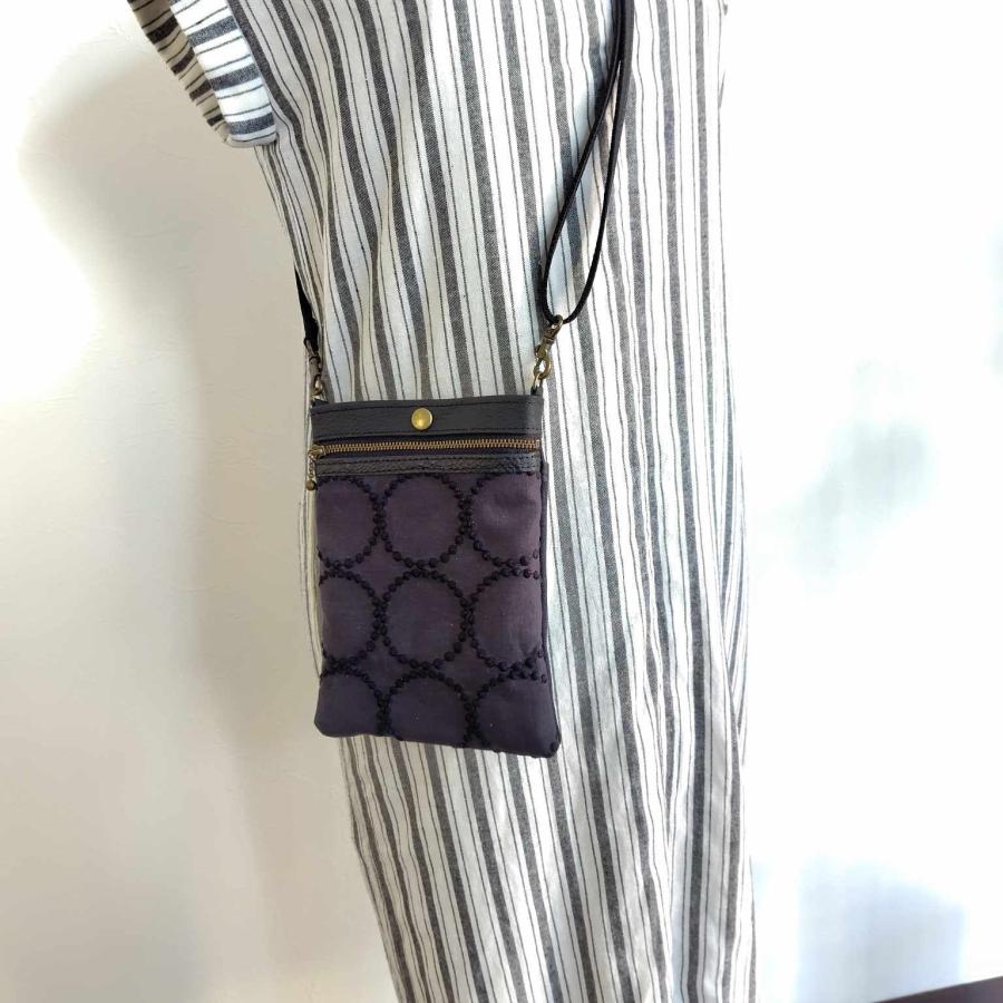 ミナペルホネン/tambourineタンバリンブラック×ブラック/スマホ