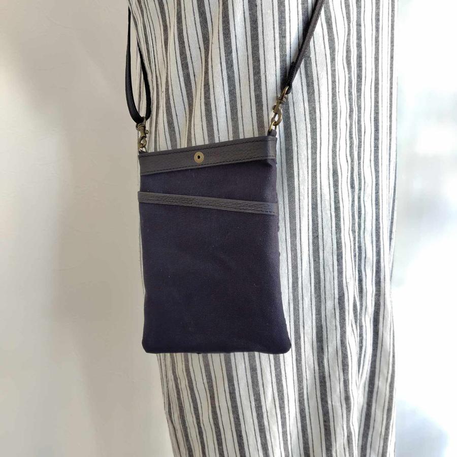 ミナペルホネン/tambourineタンバリンブラック×ブラック/スマホ