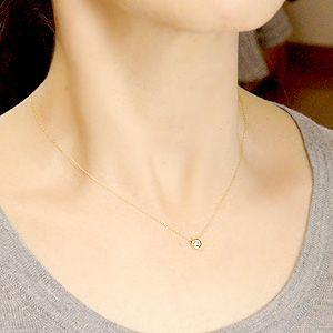 ダイヤモンドネックレス K18一粒ダイヤモンドペンダント 裏側はフラワーデザインの画像