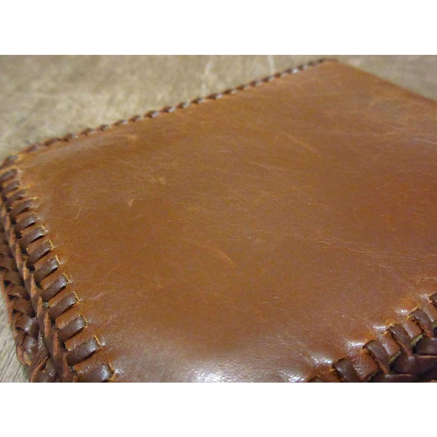 チェルシー様専用ヴィンテージカービングレザーオレンジ レザー 長財布