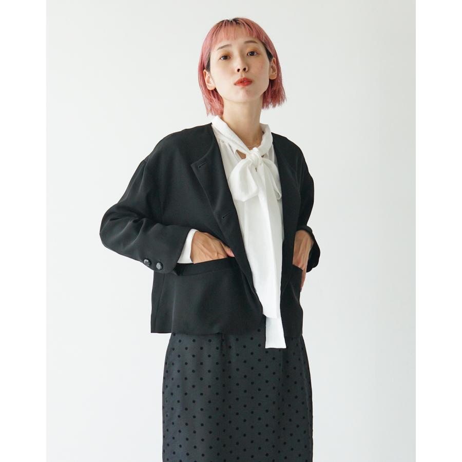 ドゥロワー ノーカラージャケット フリンジ付き ホワイト/ブラック ドゥロワー ノーカラージャケット フリンジ付き ホワイト