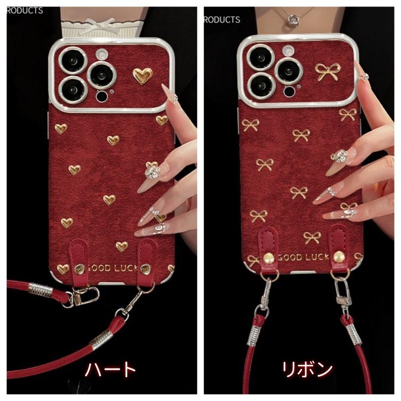 レッド赤色 喜び色ゴールドハートリボ ハンドストラップ付きお出かけ