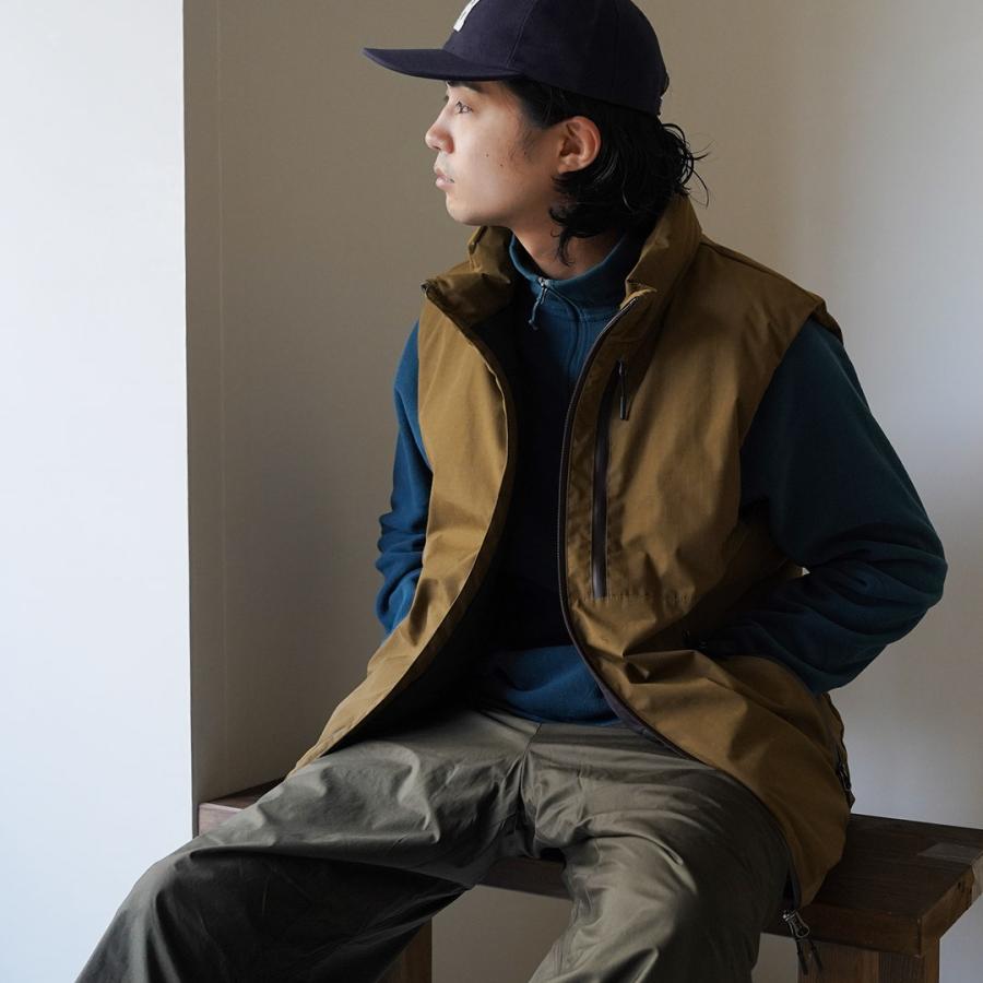 NANGA（ナンガ） 別注 HINOC ヒノック スタンドダウンベスト / 前開き
